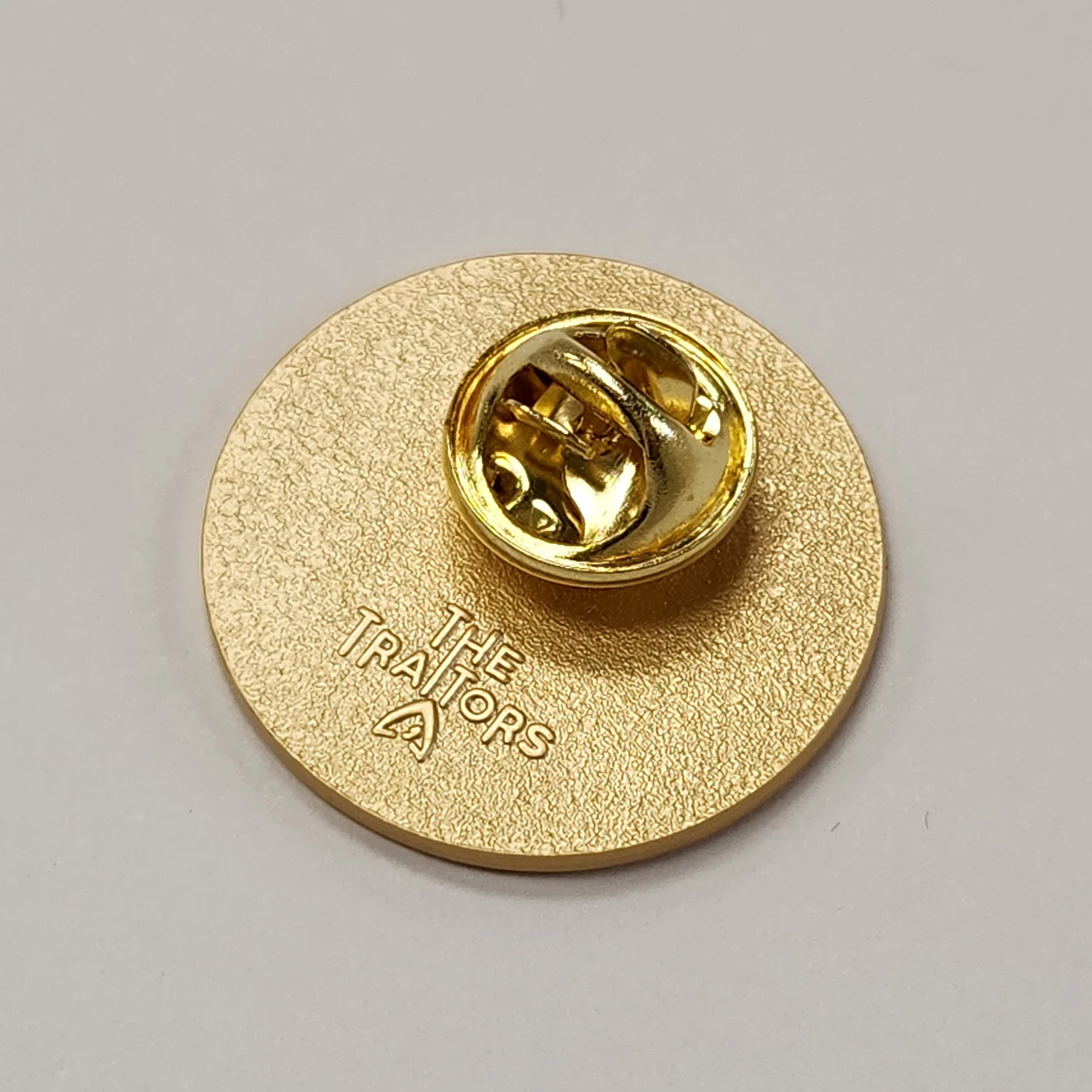 The Traitors Round Table Gold Pin Badge - Live (Click and Collect only) - Image 3